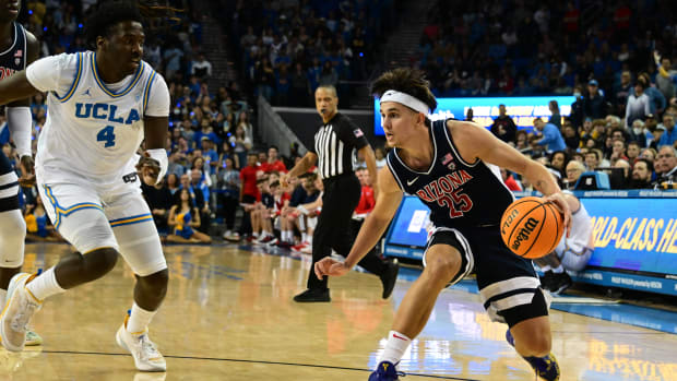 UCLA Bruins guard Will McClendon defends Arizona Wildcats guard Kerr Kriisa.
